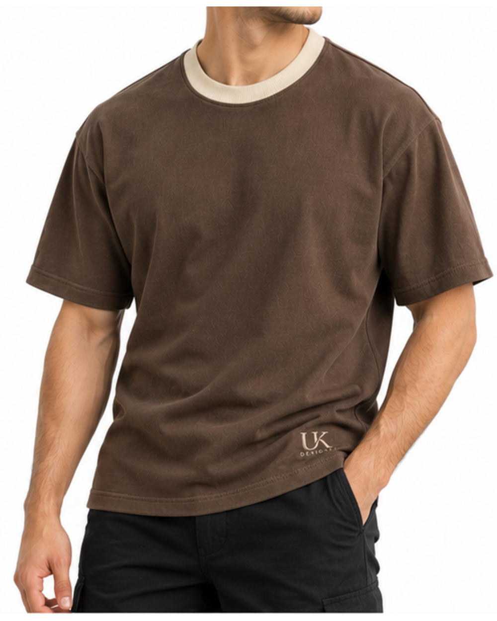 Model in the clay brown boxy T-shirt with black trousers, angled view
