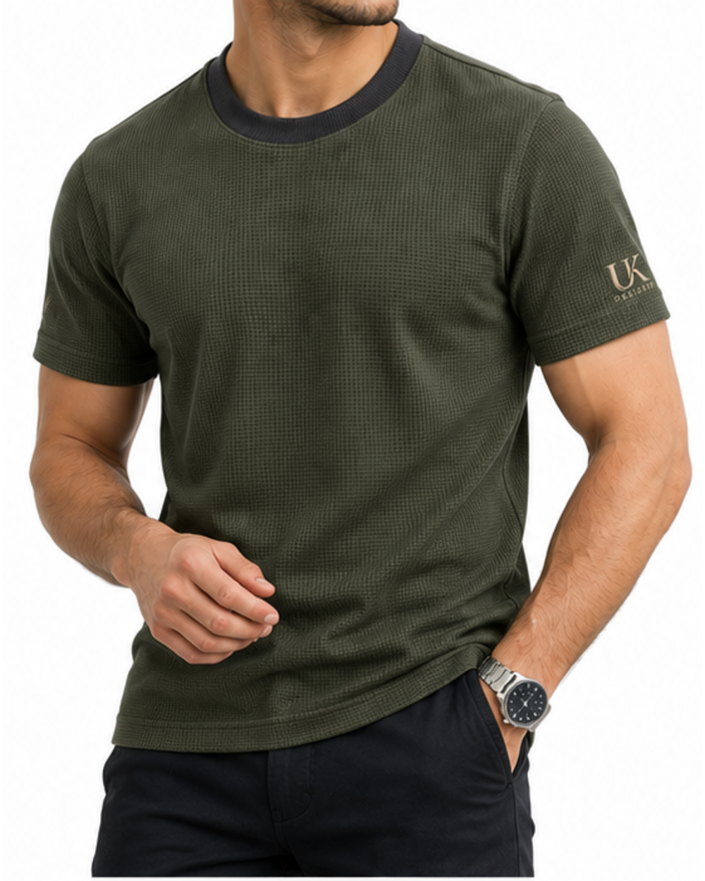 Model in the olive waffle T-shirt with navy trousers, angled view