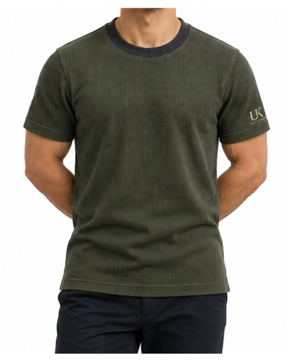 Model in the olive waffle T-shirt with hands behind the back