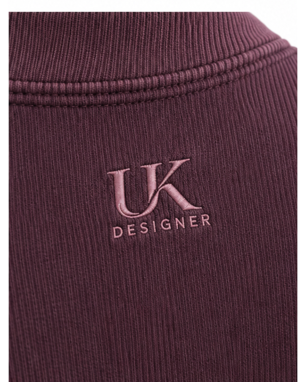 Close-up of the compact rib and rosewood logo on the upper back