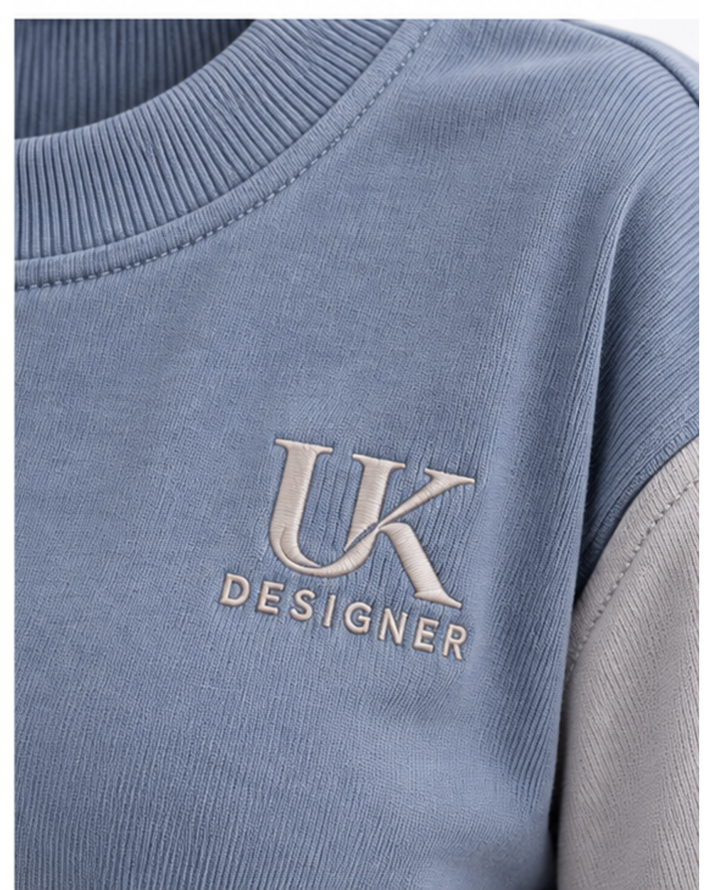 Close-up of the ribbed crew neck and embroidered chest logo