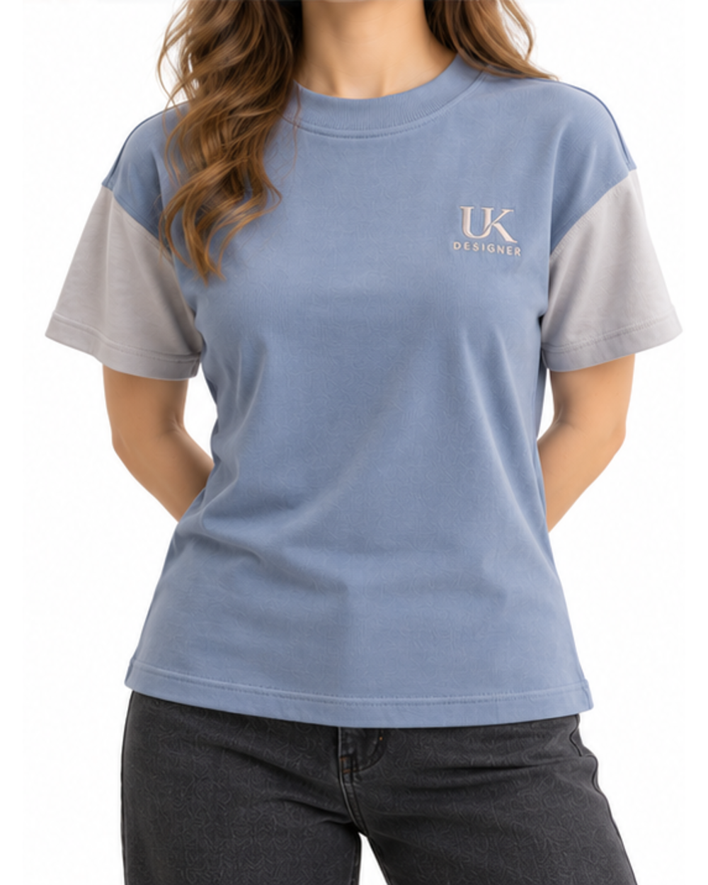 Model in the glacier blue T-shirt with black jeans, front